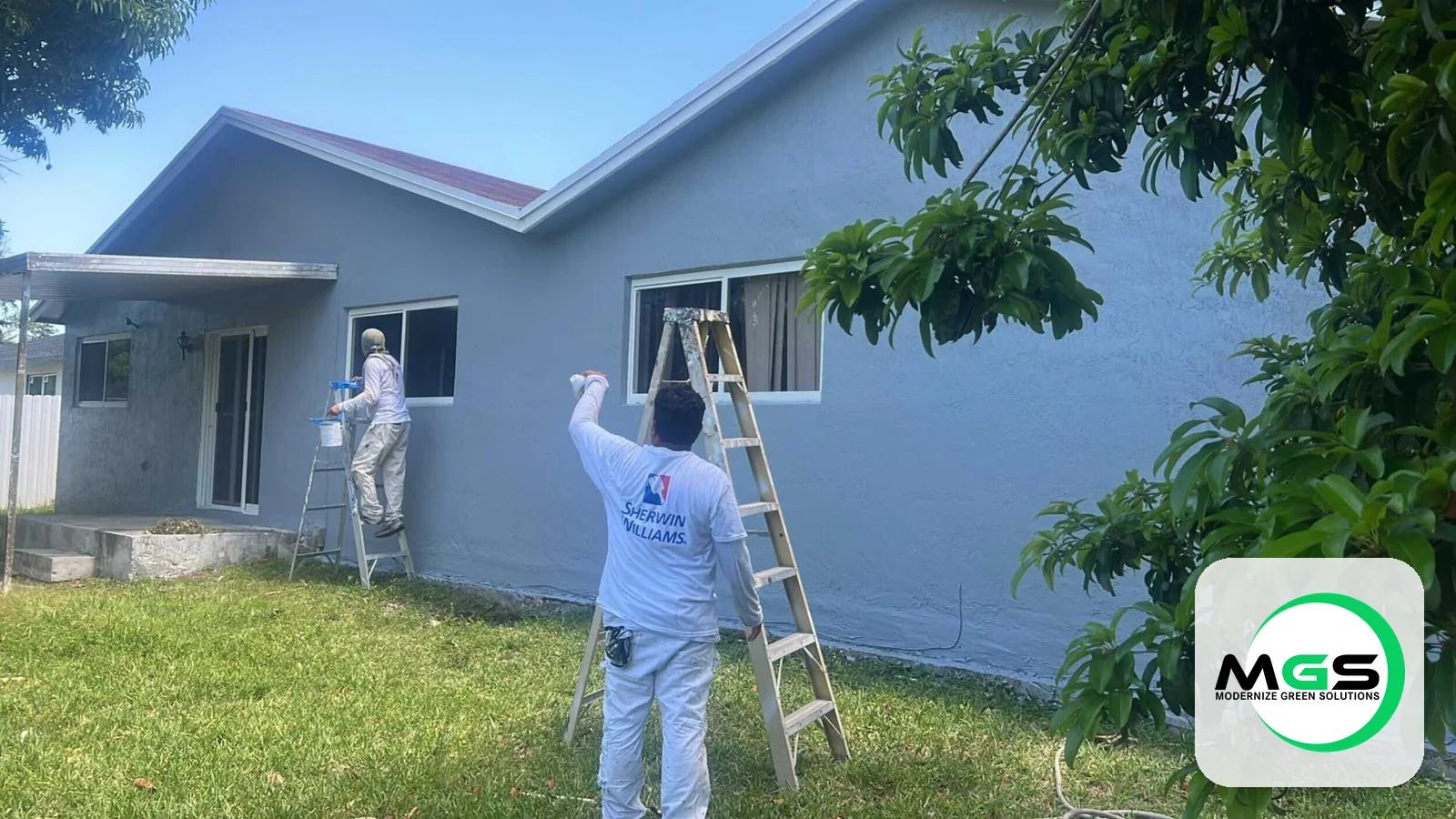 Professional painters at work by Modernize Green Solutions