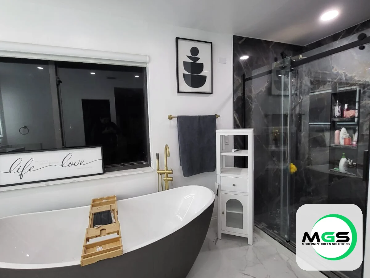Bathroom remodel with a freestanding tub and walk-in shower by Modernize Green Solutions
