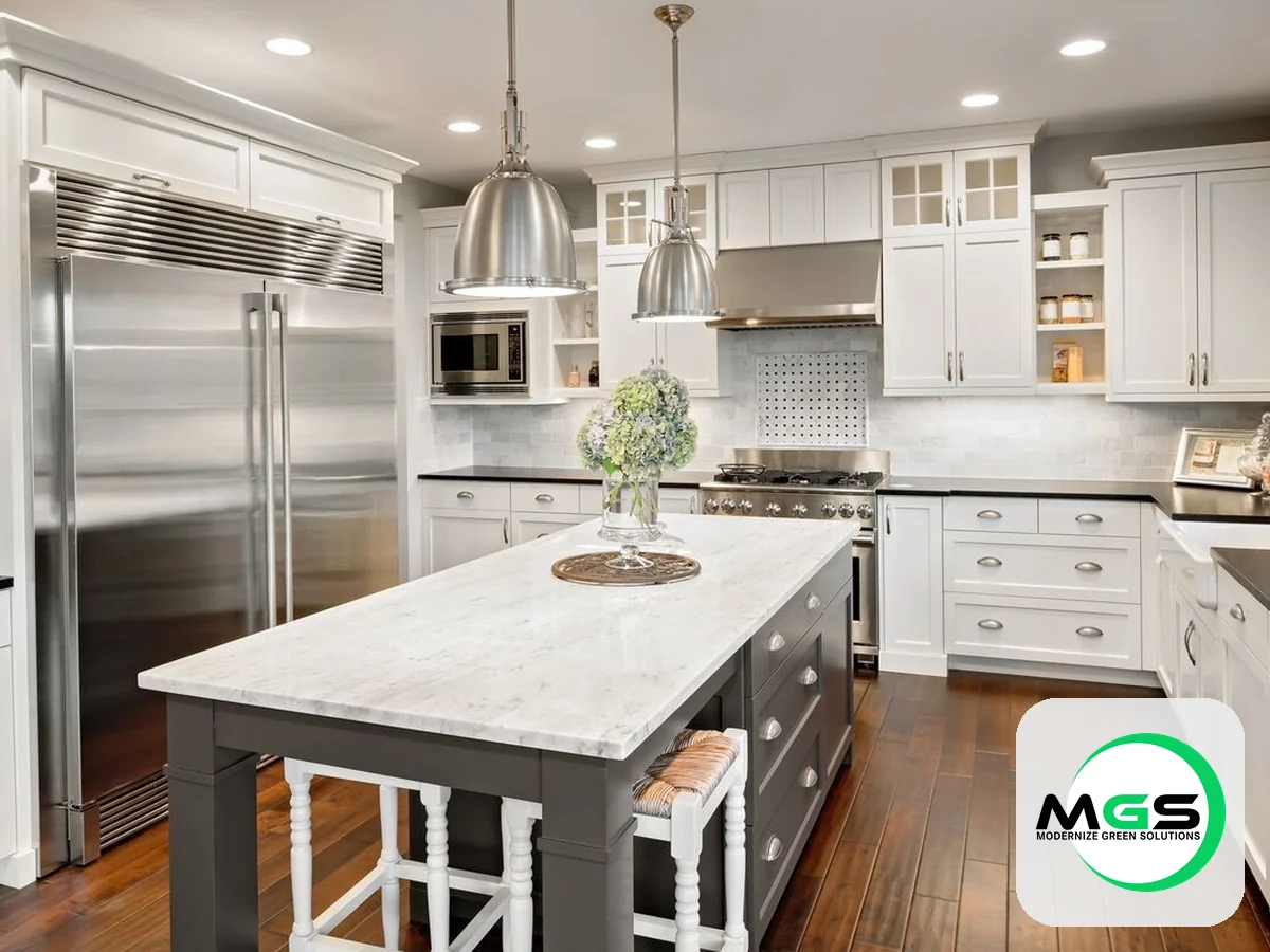Modern white kitchen remodel with a marble waterfall island by Modernize Green Solutions