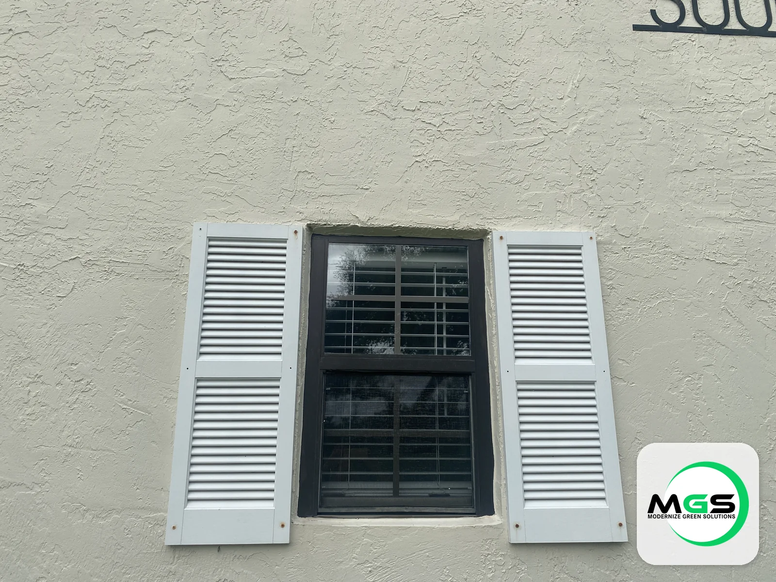 Impact window with shutters by Modernize Green Solutions